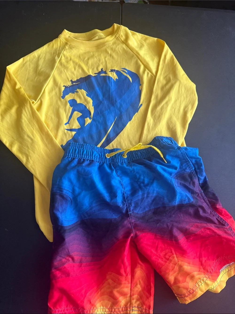 Yellow Rash Guard with Blue Surf Graphic & Sunrise Ombre Board Shorts